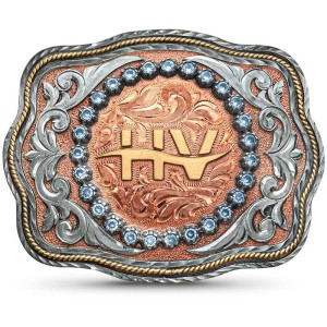 A custom belt buckle for men featuring a personalized ranch brand built on an antiqued copper base adorned with silver scrolls and beads